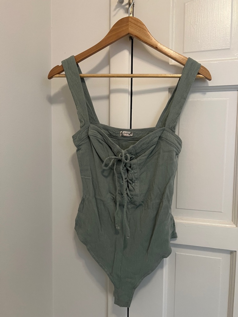 Free People Lace-Up Sleeveless Bodysuit in Sage